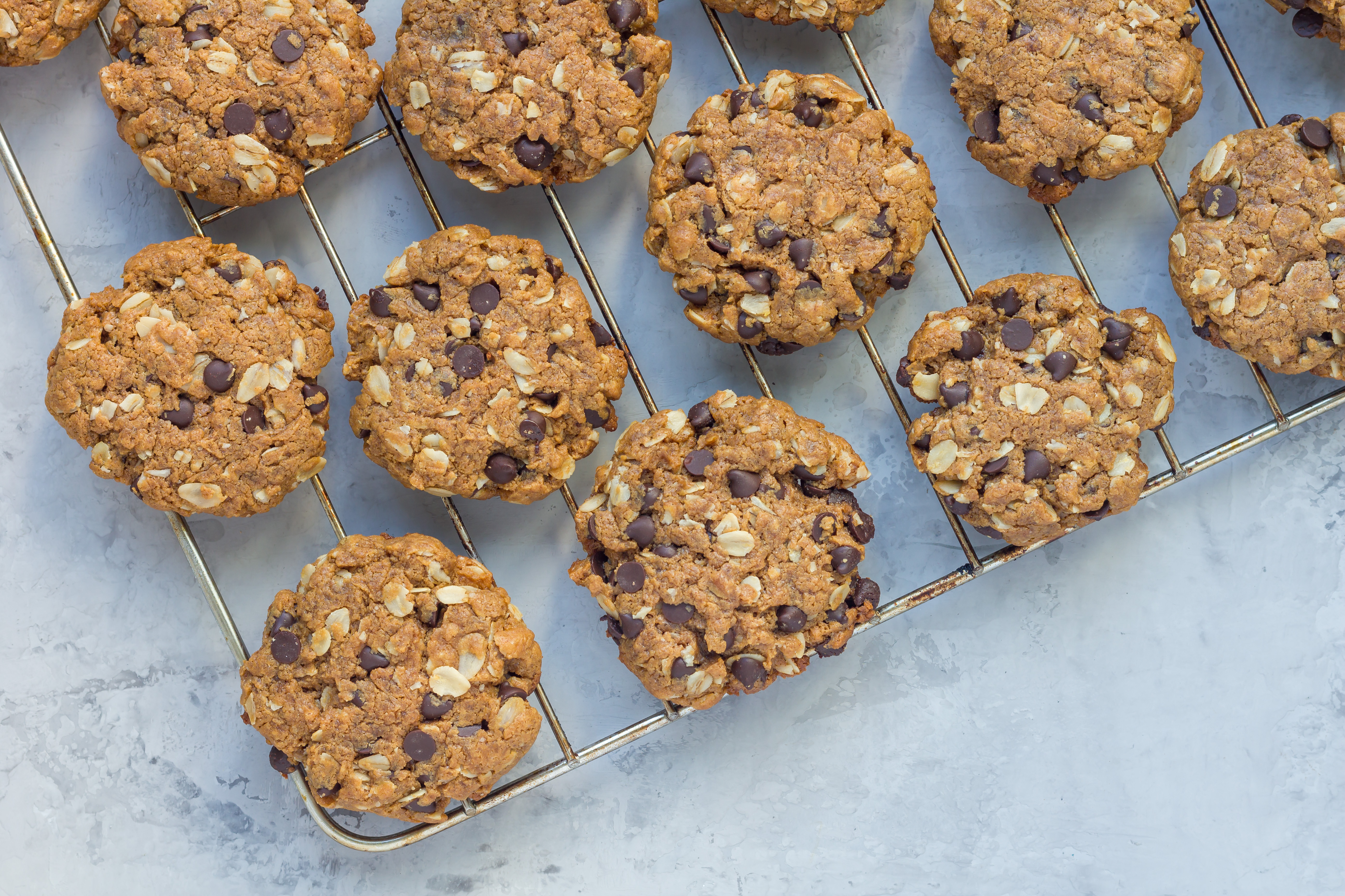 Oatmeal chocolate chips cookies on wire rack