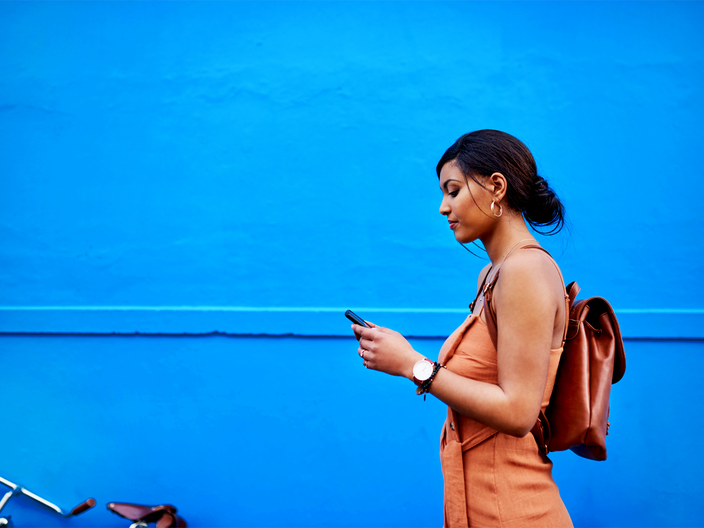 Photo of a woman using a mobile phone