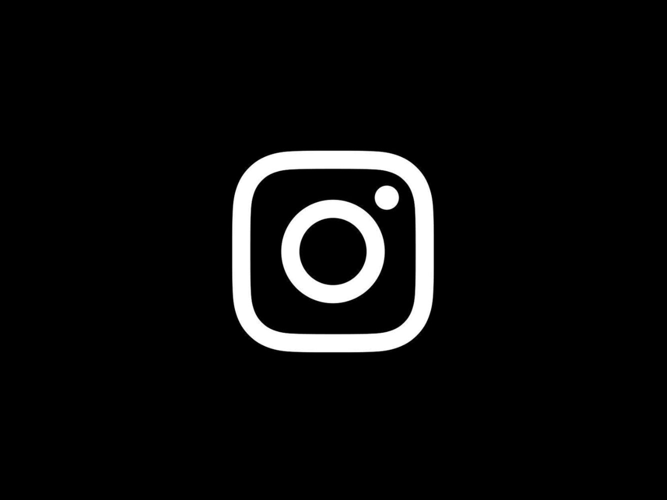 Instagram glyph on black background