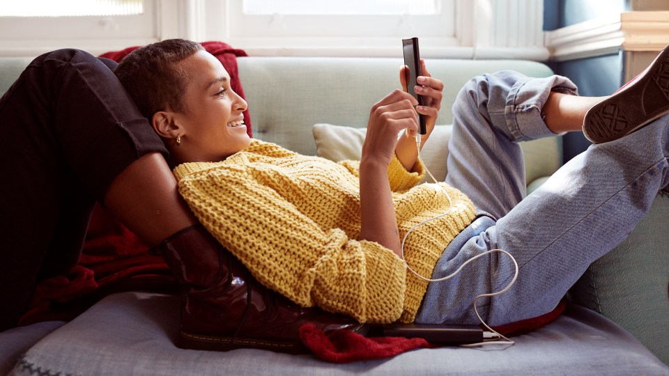 Photo of a woman shopping on her phone