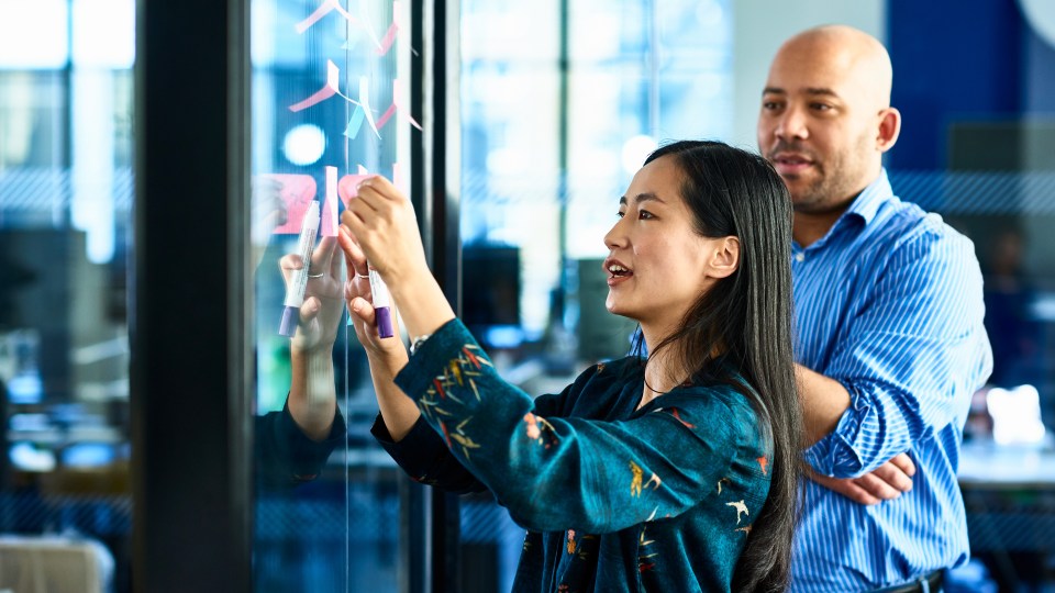 Image of man and woman working