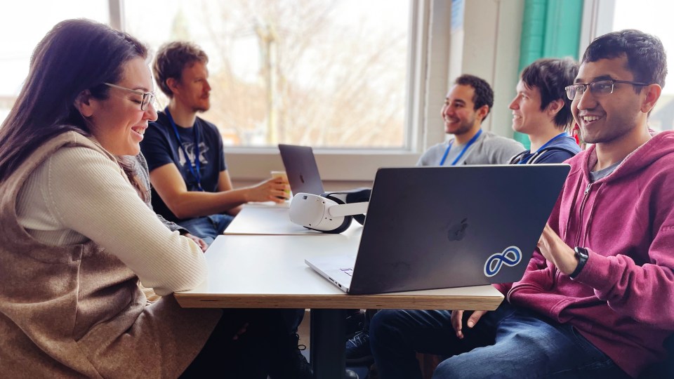 Image of employees at the office in Canada