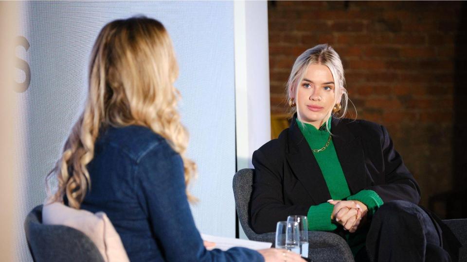 Two people on a stage