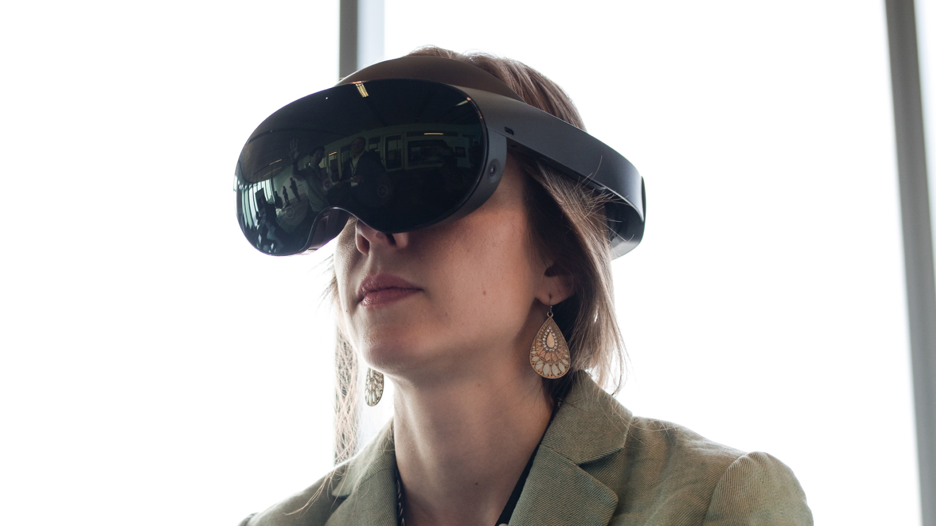 Photo of a woman using a Meta Quest VR headset