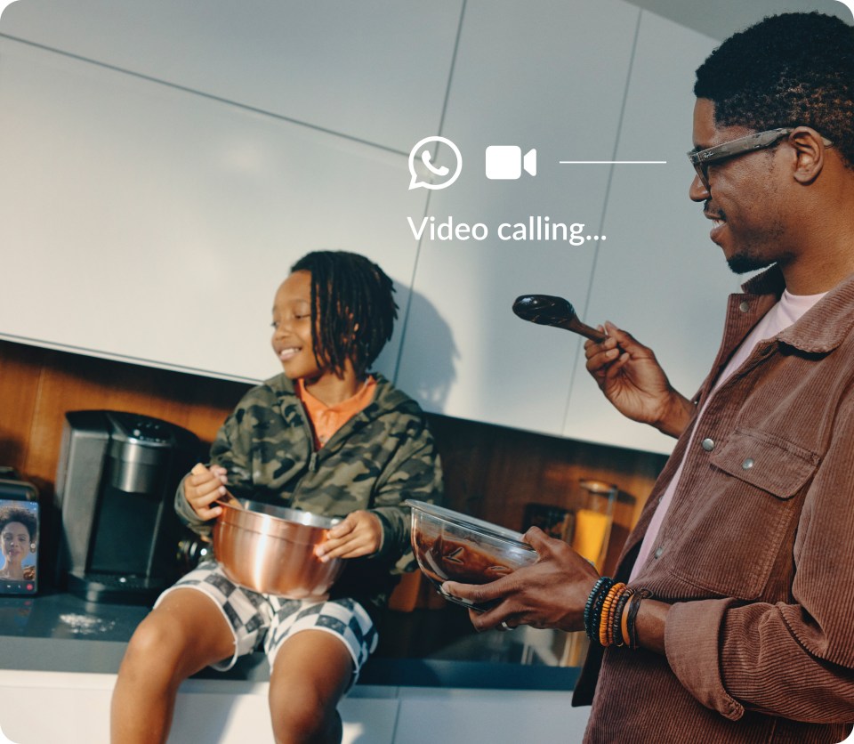 Image showing hands-free video calling on Ray-Ban Meta smart glasses - a father cooking with his child