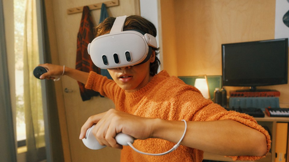A young person using the Quest headset.