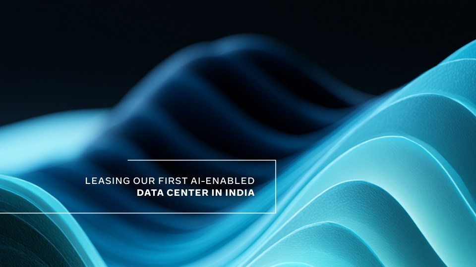 Abstract image with the the text "Leasing Our First AI-Enabled Data Center in India" on top
